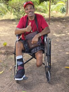 Young woman using wheelchair and reading – education accessibility.